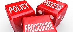 Policy, Process and Procedure words on three red dice to illustrate a company or organization's practices, rules and regulations
